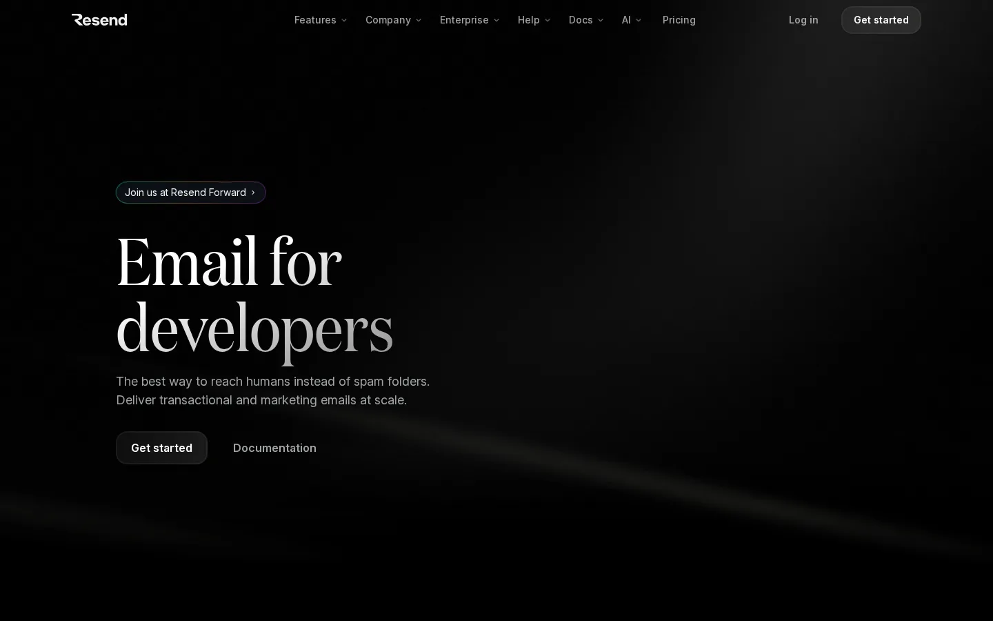 Resend homepage at 1440×900: dark ground with a diagonal light sweep and a serif display headline.
